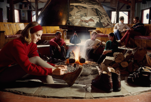 natgeofound:Skiers relax by a fire at a Stowe dormitory in Vermont, August 1967.Photograph by B. Ant