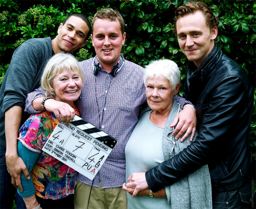Tom Hiddleston, Dame Judi Dench, Penny Ryder and John Macmillan with director Chris Foggin on the se