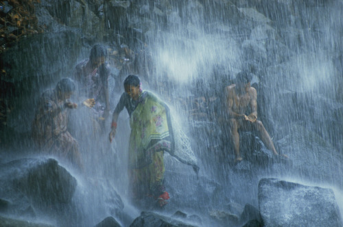 Pilgrims bathe in the Narmada&rsquo;s 160-foot-tall Kadil Dhara waterfall in India, November 198
