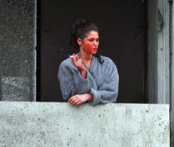 puppies-and-poledancers:  sandundsiebdas: Actress Gemma Arterton on a break during the filming of ‘Byzantium’. She went out to the balcony for a smoke and forgot to clean the fake blood off her face. Awesome. Well, if this isn’t fucking me I don’t