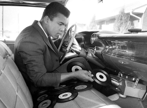 Vintage photographs of a time when cars had vinyl record players. See more here…