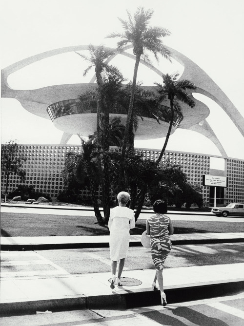 1964 With his trademark tilted horizon, Garry Winogrand’s photograph of two women in front of the Th