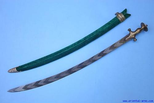 machiavellianfictionist:Indian tulwar with a beautiful blade. The chevron pattern is forged in damas