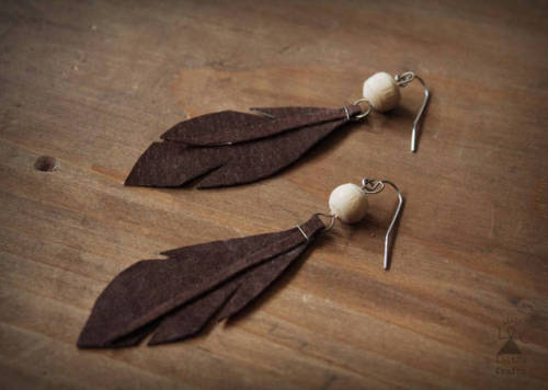 A pair of handmade leaf earrings, super light and crafted from a super soft and light up-cycled sued