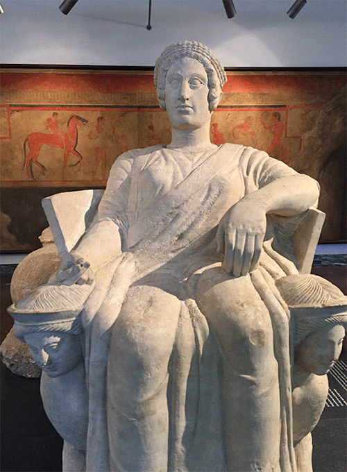 Goddess and a Place of Sacrifice?The goddess of the underworld sits on a throne, guarded by sphinxes