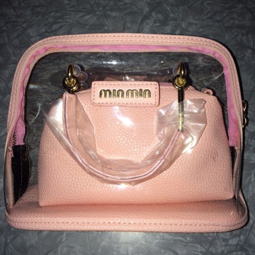 ltracks:Super cute purse from Korean brand Min Min. Smaller pochette inside a clear purse. Bag is ro