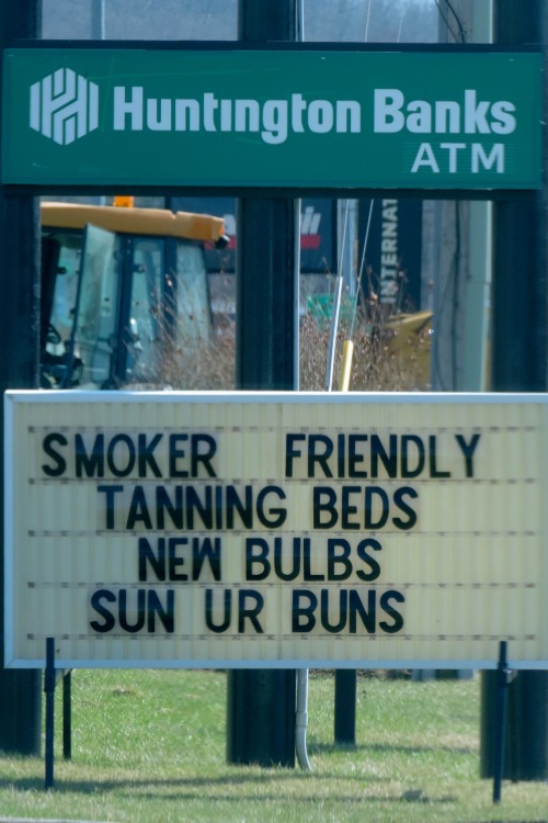 Sign, Elkins West Virginia, 2014.After taking money out, you can get both lung and skin cancer at th