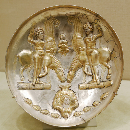 Gilded silver plate from the Sasanian Empire, depicting youths with winged horses.  The iconography 