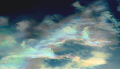 nubbsgalore:  photos of cloud iridescence — caused as light diffracts through tiny ice crystals or water droplets of uniform size, usually in lenticular clouds. (photos) 