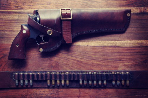 whiskeyandspentbrass:  30roundrevolution:  craftandlore:  Completed this custom gun leather for a friend.  Wow.  That’s fantastic.