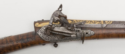 Ornate Turkish miquelet rifle decorated with gold, silver, and ivory.  Circa late 18th or early 19th