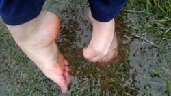 themissarcana:  Icy rain has flooded my front yard! So I’m playing in it. It is very cold and lovely