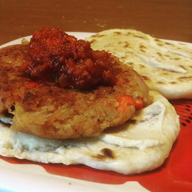 So um  Smoky white bean burgers with basil  Secret Spicy tomato sauce on top  Flatbread