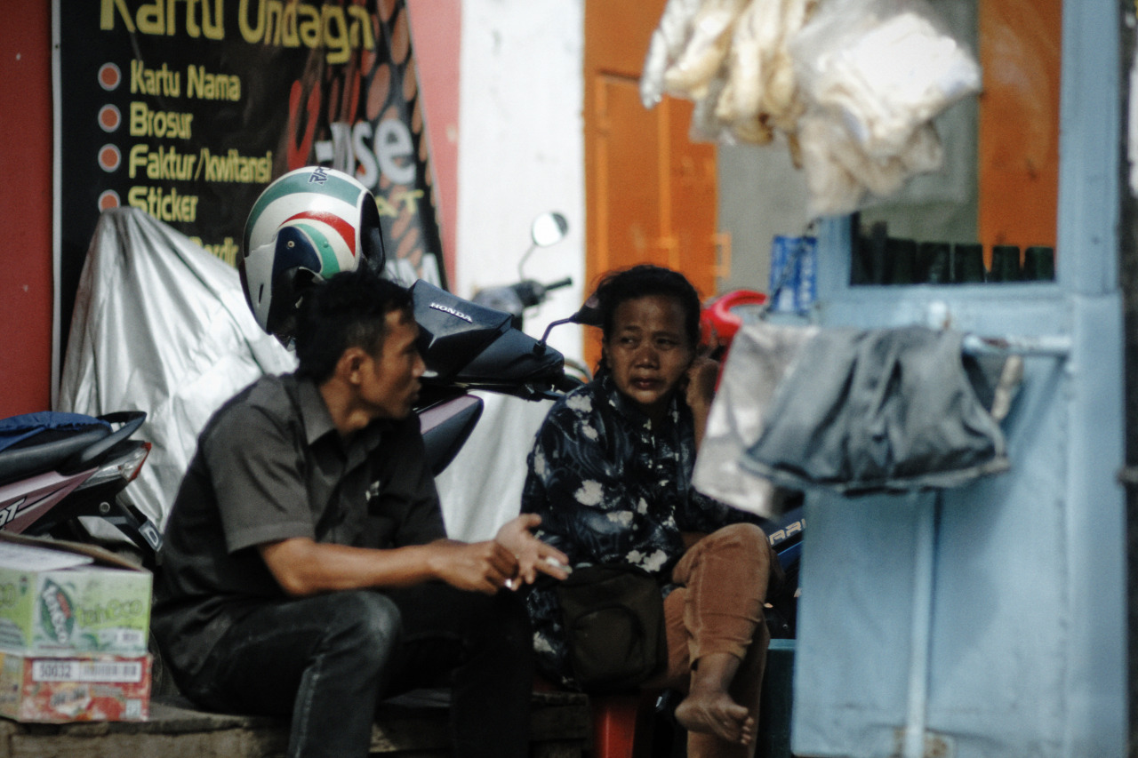 Man and woman waits for their lunch. Bandung, Indonesia