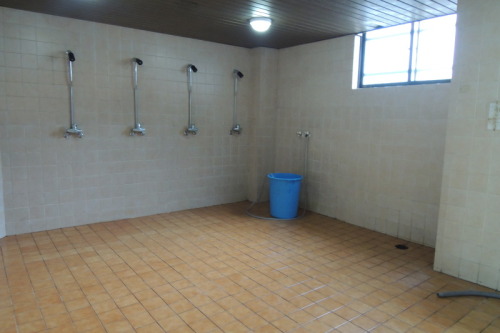 Three men’s shower rooms at Gachon University in Seongnam, South Korea.The top orange shower is in t