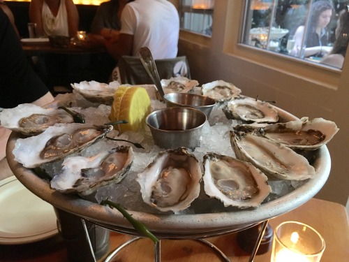 ONE OF MY FAVOURITE THINGS ABOUT SUMMER IN THE CITY ARE DOLLAR HAPPY HOUR OYSTERS. 