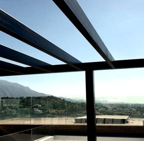 Modern DeckInspiration For A Large Modern Rooftop Rooftop Glass Railing Deck Remodel With A Fireplace