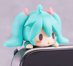 shutupandtakemyyen:  Hatsune Miku Phone PlugGive your phone some bling of kawaii with a heart-melting Hatsune Miku phone plug. They are as practicable as they are adorable, protecting your devices from potential killer dust. What would you do if your