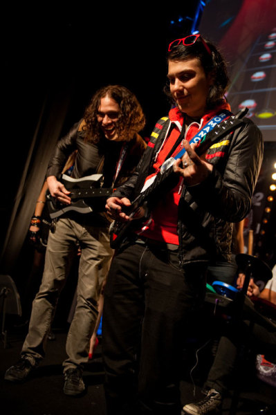 My Chemical Romance Frank Iero and Ray Toro play Guitar Hero live on stage during Paris Games Week (10/28/2010). Photography by...