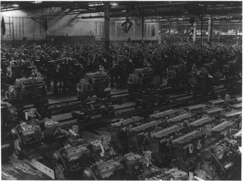 Tank engines and boats on production lines at the Chrysler Corporation automobile plant in Detroit (
