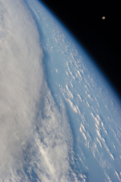 This panorama featuring Earth&rsquo;s horizon and clouds over the South Pacific Ocean, complemented 