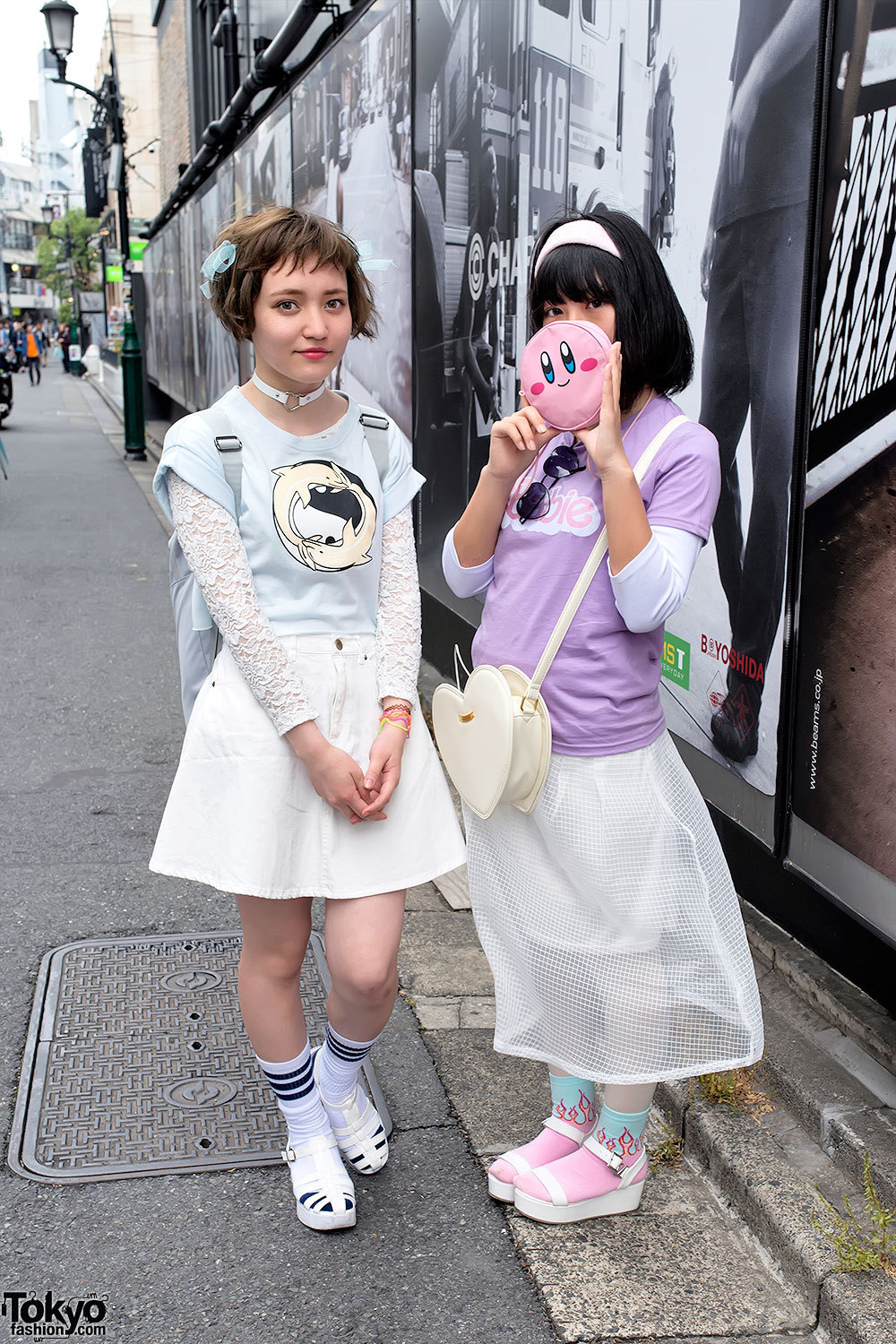 17-year-old Hana and 15-year-old Nachi on the street in Harajuku. Hana is wearing a Bubbles top with a WEGO skirt and ANAP platform sandals. Nachi is wearing a Bubbles top with a Bubbles sheer skirt and Spinns platform sandals.