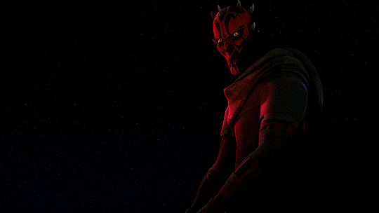 maul spinning around his saber and igniting its second end