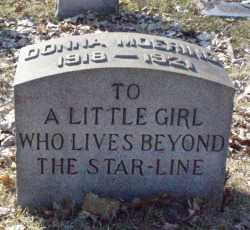 sixpenceee:A child’s grave in Forest Home Cemetery Milwaukee, Wisconsin