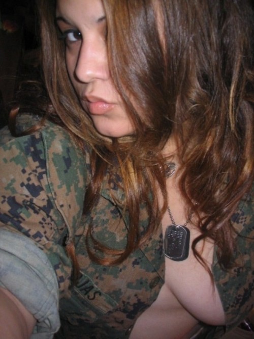 militarysluts:  Marine Pvt Rojas opens up her blouse and lets her big tits hang out.