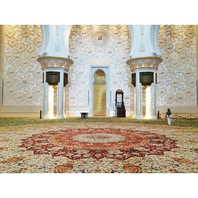 A woman admires the Mihrab are of the Sheikh Zayed Grand Mosque in Abu Dhabi. The carpets were amazing too. #sheikzayedmosque #mosque #islam #architecture #religious #mideast #travel #travelphotography #iphoneonly #latergram (at Sheikh Zayed Grand...