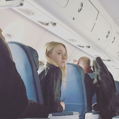 Dakota Fanning spotted by a fan on a flight to New York the other day (October 4)!