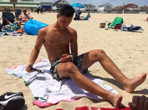 Airing out his ripe socks and feet after a long hot day