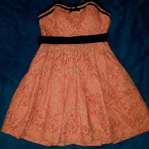 A beautiful pink/peach dress with cream lace overlay and hints of silver sparkling throughout. Can b