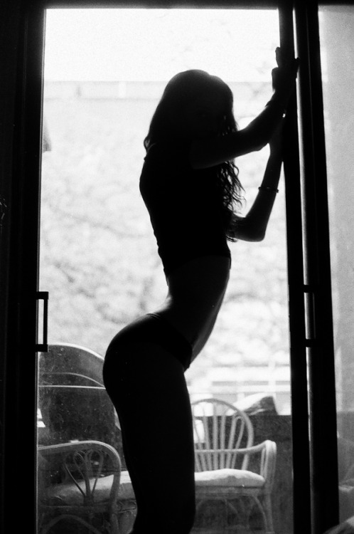 davidstrangephotography:  Silhouette by the barbecue. Unedited film scan. Model: Cam Damage 