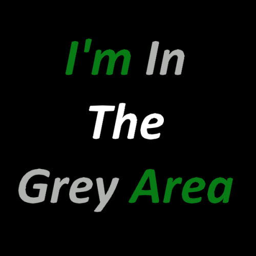 enbees-and-aros:[ID: A set of three square images of the phrase “I’m in the grey area” on a black ba