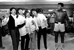 Paul McCartney, John #Lennon, Ringo Starr and George Harrison take a fake blow from #Cassius Clay - #Miami: Feb. 18, 1964