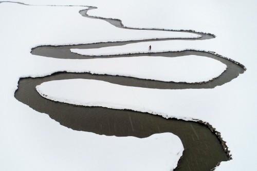 killing-the-prophet:A drone photo shows a view of the village’s meandering river after a heavy snowf