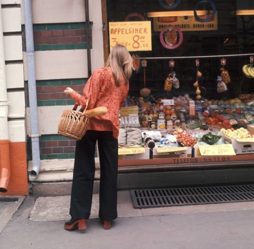 vintagenorway: Woman in front of vegetable shop, 1973