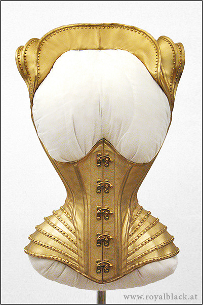 opulentdesigns:Corset Top “Millenium Robot”Couture corset top made from gold lamé with external bone
