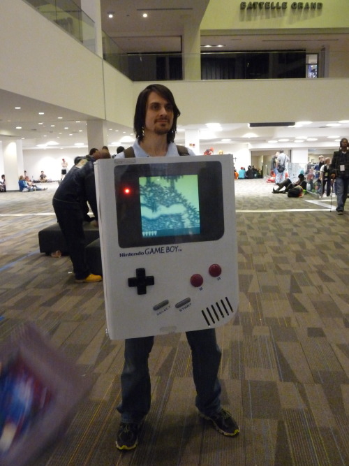 lasers-and-spikes:  rendezvousramen:  aivlistree:  This guy’s costume was entirely playable and you could switch the games in the back I just  The cosplay war is over Everyone go home  fUCK 
