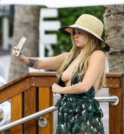 toplessbeachcelebs:  Chanel West Coast (Singer/Actress) caught taking a selfie of her boob in Miami (December 2016)