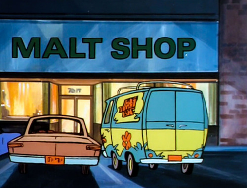 scoobydoomistakes: The gang’s chilling at the malt shop, as per usual. The Mystery Machine sit