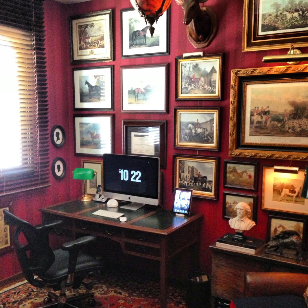 Reader Ed Siatti’s art filled workspace submission.