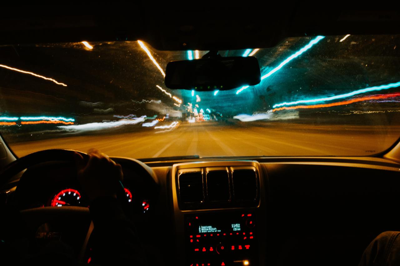 Driving at night. View from inside a car driving at night. sharp
