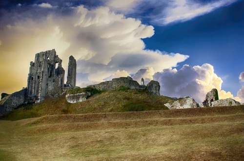 “As he spoke, he paused before a great mound grown over with trees, and around it silver clear