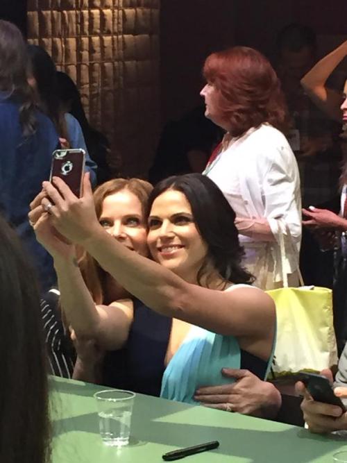 Rebecca Mader copping a feel taking selfies with Lana Parrilla at San Diego Comic Con 2015.