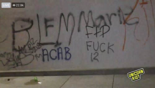 Graffiti seen in Minneapolis during the riotous protests following the police murder of George Floyd