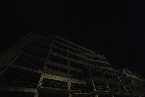 sovietgoner:&lsquo;Glow&rsquo; Abandoned multistorey and big city lights.