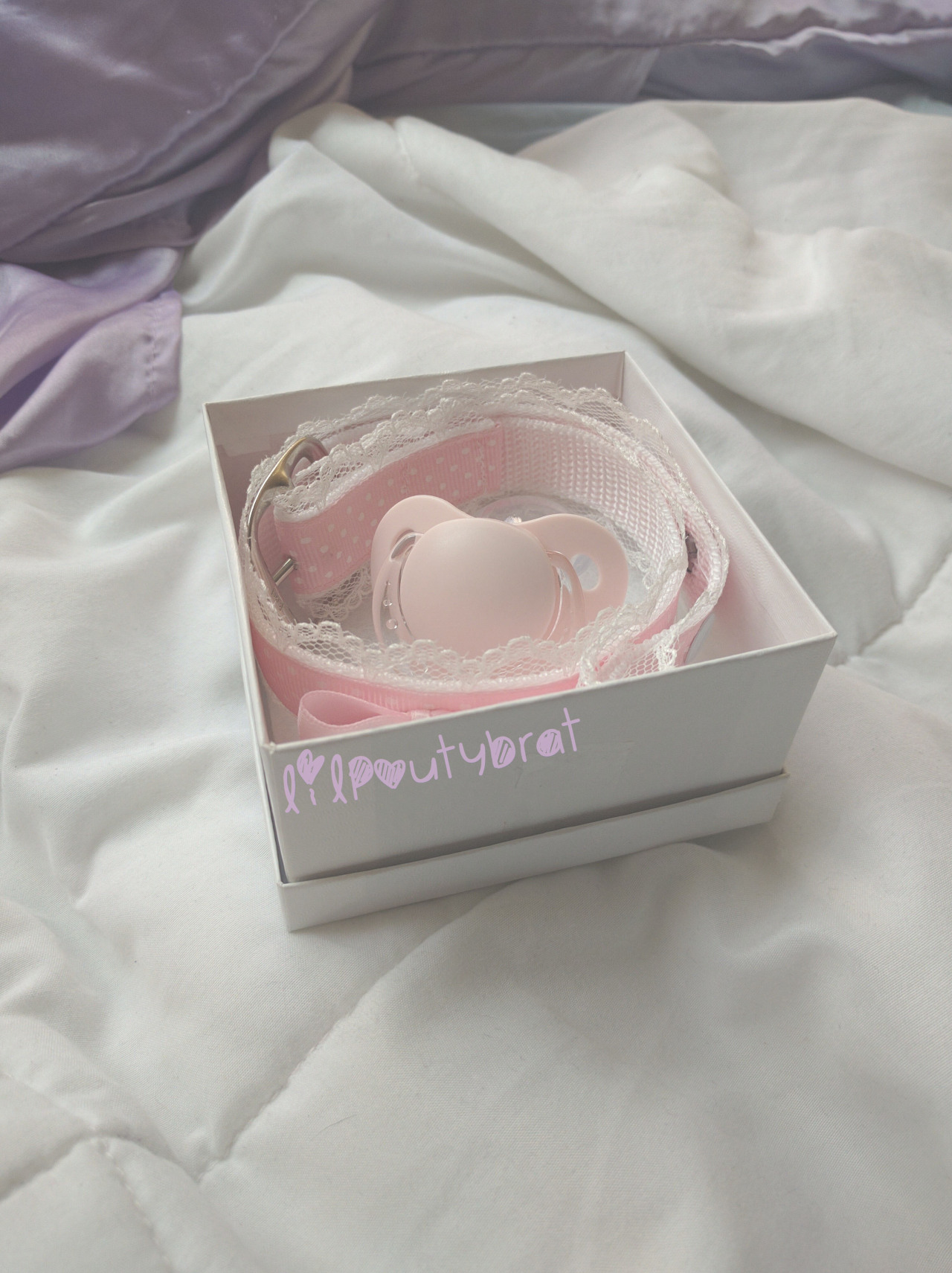 lilpoutybrat:  my binky and my collar stay in this little box when I’m away 💗