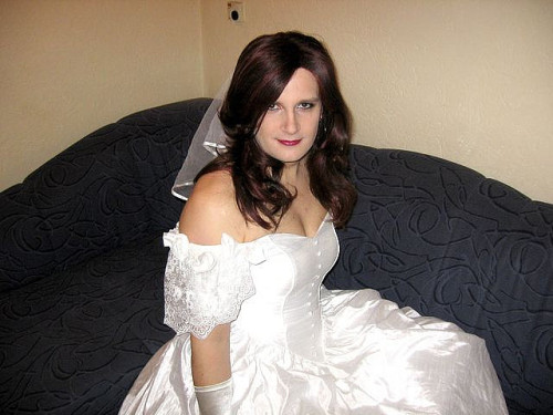 This young and beautiful German bridal crossdresser is Nicole.